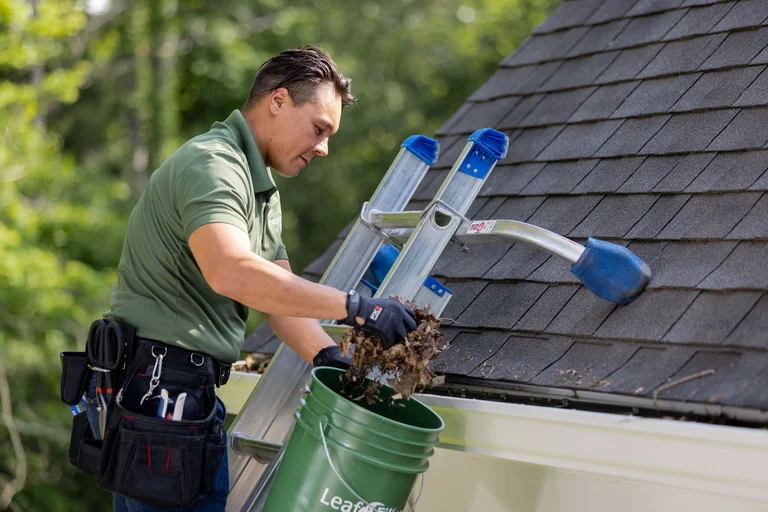 Akron LeafFilter professional cleaning gutters