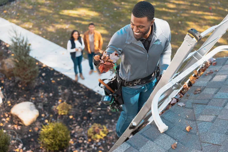 Eau Claire LeafFilter professional cleaning gutters